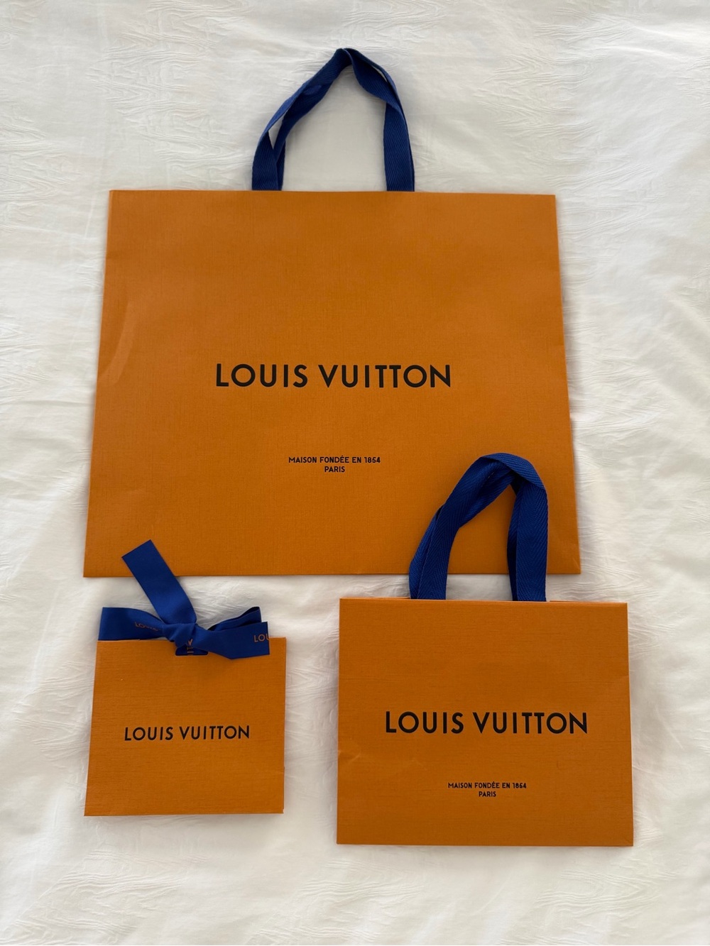 Louis Vuitton Orange Tote Bags with Blue Handles